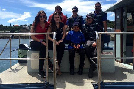 Rocco (front, 3rd from right) with some Sea Star Lodge staff members and crew members of the whale watching boat, Ivanhoe